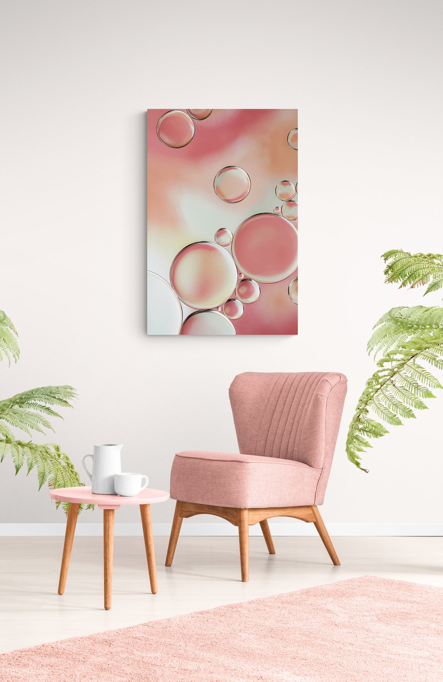 Experience captivating contemporary abstract art with "Blossoms 3." This gallery-quality macro photograph showcases the vibrant interplay of oil and water set against a colorful backdrop, offering a symphony of colors and intricate patterns. Standalone or paired with other Blossoms pieces, it's available as a long-lasting acrylic photo print. Perfect for enhancing your living or office space and inspiring conversations. Image shows Blossoms 3 hanging in living room with pink chair and coffee table.