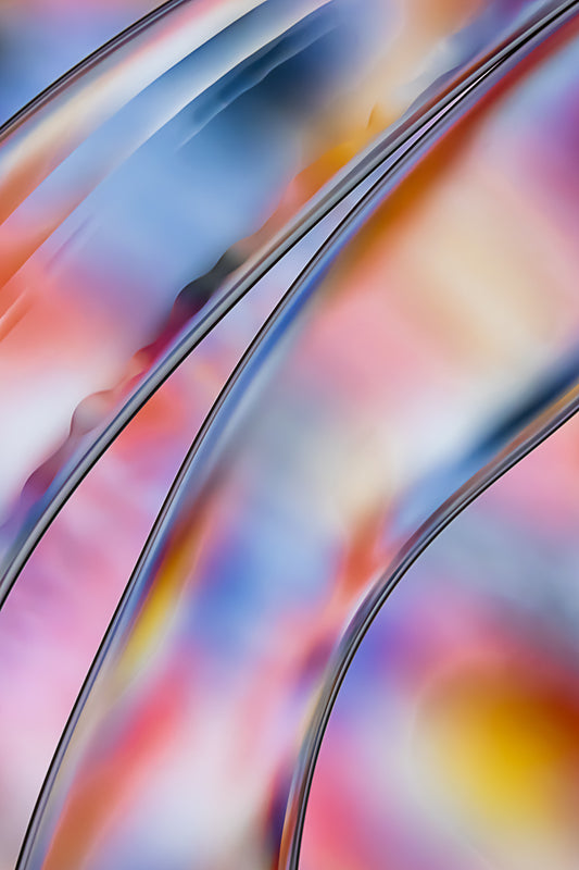 Experience the captivating macro abstract photograph "Circus 2" capturing the dynamic dance between oil and water in stunning detail. This gallery-quality fine art abstract acrylic print unveils vibrant colors, fluid textures, and intricate shapes, inviting you into an otherworldly realm. Perfect for diptych or triptych arrangements alongside 'Circus 1' and 'Circus 3.' Backlit acrylic appearance, protected by dibond backing, and enhanced by polished edges. Available sizes cater to your preferences.